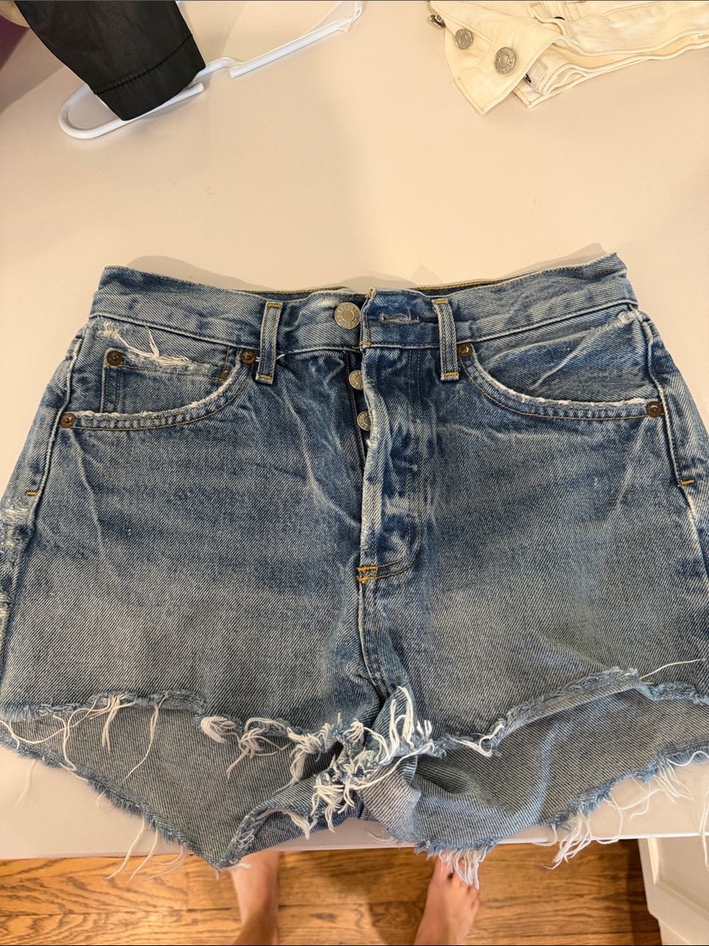 Agolde Distressed Light Blue Denim Cutoff Shorts